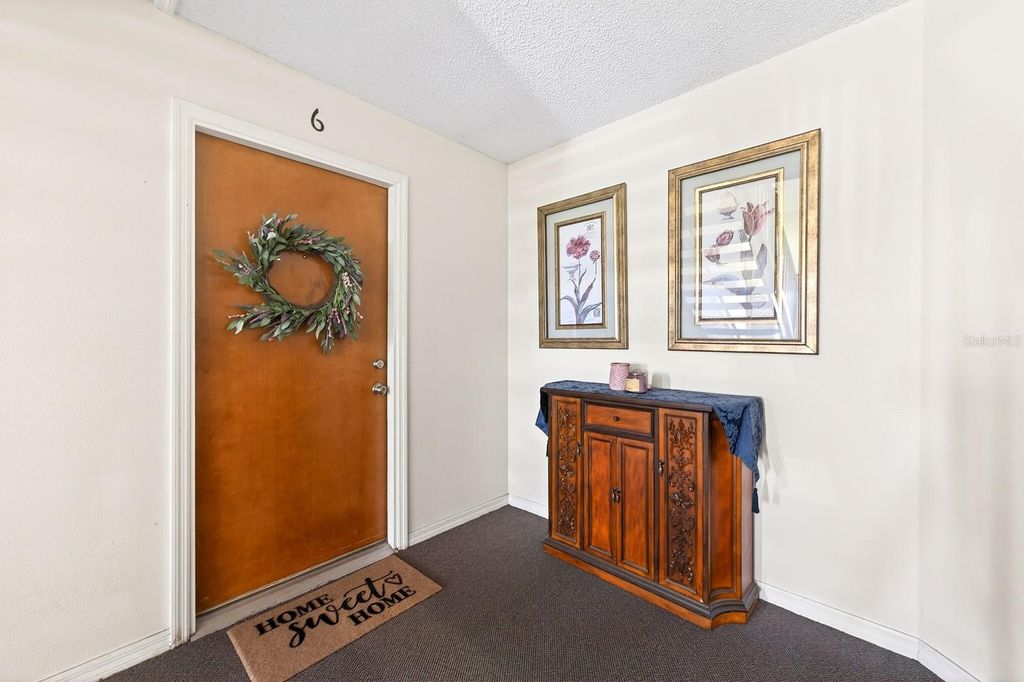 Photo of 2412 Tack Room Lane #6, Orlando, FL 32812 (MLS # O6410448)