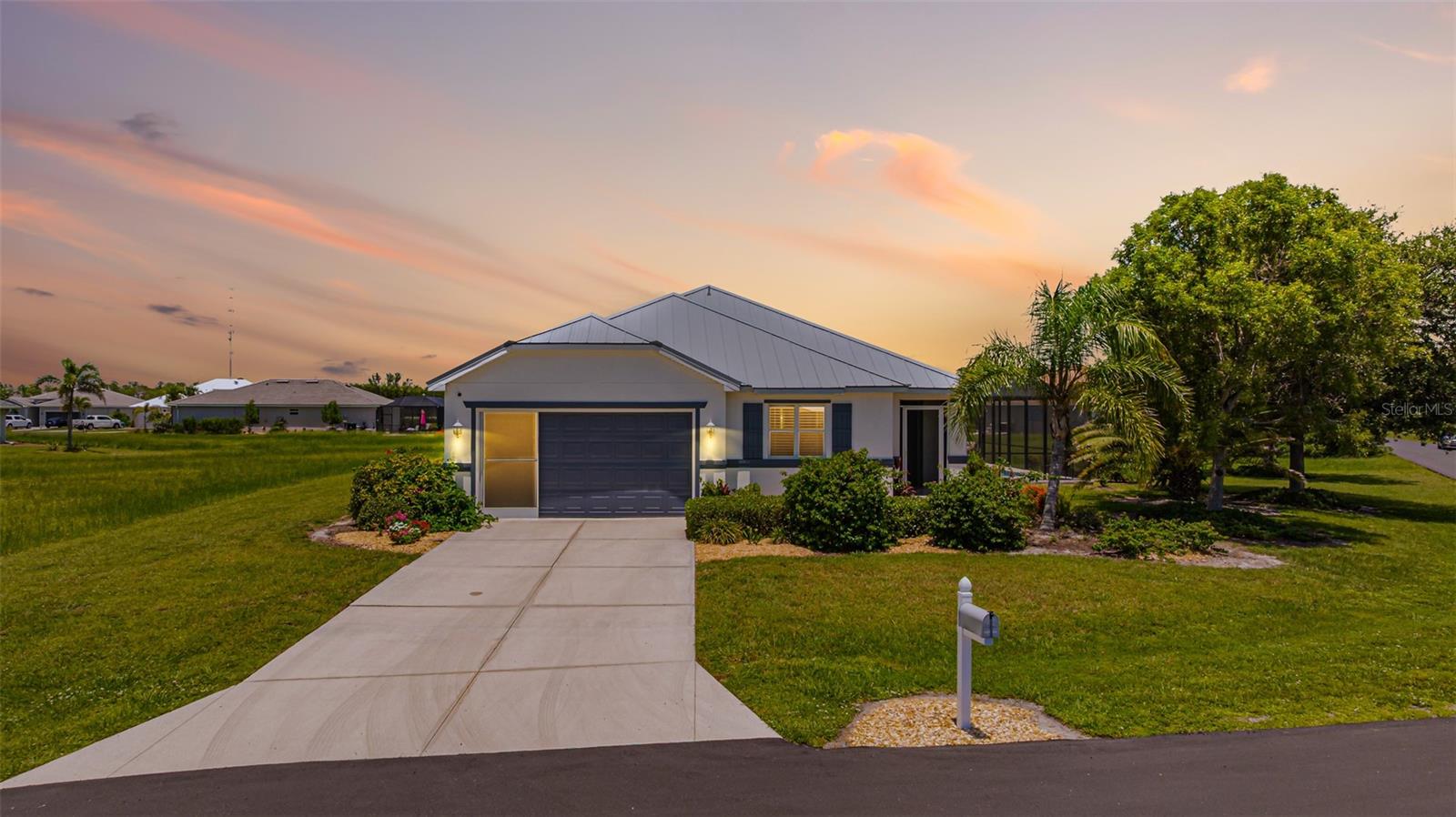 Welcome to your dream home in the desirable, deed-restricted community of Burnt Store Lakes! This beautifully maintained 3 bedroom, 2 bath home with an office/study is perfectly positioned on a large lot along a quiet circle-loop cul-de-sac road, offering peace, privacy, and minimal traffic—an ideal setting for full-time living or a seasonal escape. The low annual HOA is an outstanding benefit.
Inside, you’ll find a bright and open split-bedroom floor plan, featuring a spacious Living room, formal dining area, separate family room/den next to the kitchen and a dedicated office/study perfect for working from home, creative space or separate TV room. The owner’s suite boasts, a walk-in closet, and a large ensuite bath with a walk-in shower.
Step outside to your own private backyard oasis! The saltwater pool and screened-in pool cage allowing plenty of room for entertaining, relaxing, or simply soaking in the Florida sunshine and magnificent sunsets. Surrounded by tropical landscaping and extra green space, the yard feels like a serene retreat.
• No flood insurance required – located in a no flood zone!
• Quiet cul-de-sac loop – perfect for privacy and safety
• Two-car garage and driveway for ample parking
• Screened garage doors for ventilation
• New Metal Roof in 2023
• AC System in 2020
Residents of Burnt Store Lakes enjoy beautiful freshwater lakes, kayak launch, a community park with picnic pavilion, and walking/biking paths. Just next door, Burnt Store Marina offers boating, golf, waterfront dining, fitness center, tennis, and pickleball. Ideally located between Punta Gorda and Cape Coral, you’ll have easy access to shopping, dining, and SWFL’s best beaches.
This partially furnished home blends comfort, function, and the outdoor Florida lifestyle — don’t miss this incredible opportunity to live where others vacation!