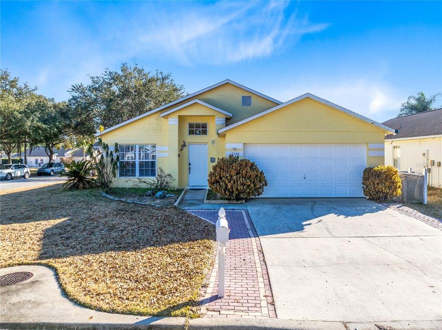 Welcome to this 5 bedroom, 2.5 bath single story pool home situated on an oversized corner lot in the Clear Creek community of Clermont. With a functional split bedroom layout and vaulted ceilings that enhance the sense of space, this home offers flexibility and true Florida living.

The open living and dining areas feature tile flooring and large sliding glass doors that lead directly to the screened lanai, creating seamless indoor outdoor flow. Natural light fills the main living space, and the vaulted ceilings make the home feel larger than its footprint.

The kitchen is bright and functional with solid wood cabinetry, generous counter space, ample prep area, and a dedicated eat in dining space surrounded by windows.

Privately positioned on its own wing, the spacious primary suite features vaulted ceilings, a walk in closet, and an en suite bath with dual sinks and walk in shower. Four additional bedrooms are located on the opposite side of the home, providing excellent separation for guests, family, or flexible use.

Step outside to your private heated pool enclosed within a large screened cage with both covered and open deck space. The expansive lanai spans nearly the entire width of the home, making it ideal for relaxing or entertaining.

Situated on a spacious corner lot with added yard space, a two car garage, extended driveway, irrigation system, and low HOA, this property offers space, functionality, and value. Conveniently located near shopping, dining, major roadways, and Central Florida attractions.