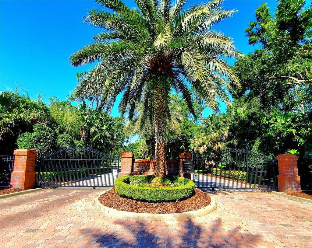 Photo of 10004 Tree Tops Lake Road, Tampa, FL 33626 (MLS # TB8474861)