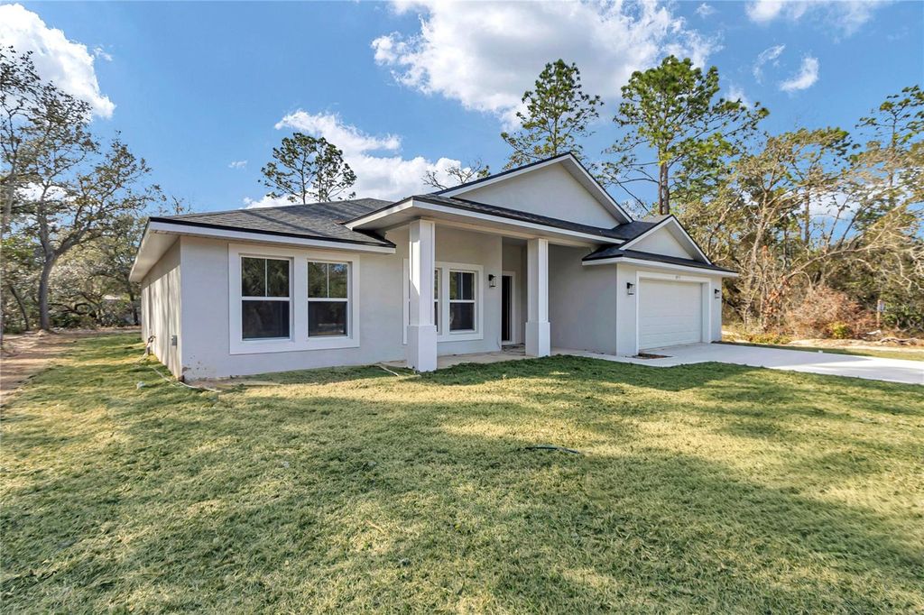 Photo of 6951 SW 151st Place, Dunnellon, FL 34432 (MLS # O6384899)