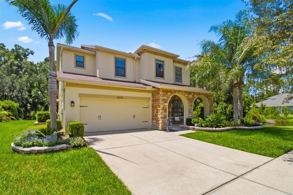 Photo of 32126 Garden Alcove Loop, Wesley Chapel, FL 33545 (MLS # TB8538390)