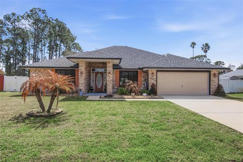 Photo of 129 Fort Caroline Lane, Palm Coast, FL 32137 (MLS # FC316715)