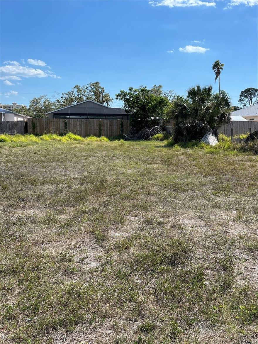 Rare Opportunity to Purchase a Beautiful Building Lot in the Tropical Shores Neighborhood Area just East of the Trail at this Price! The Lot Next Door is also for Available for Sale (MLS A4641766) so you could potentially Own a Double Lot and Build a Fantastic House close to the Water and yet be in a NO Flood Zone! Lot size is 50x126. Non-Deed Restricted. Park your Boat or RV at Home! NO HOA. Community Boat Ramp Close By. Just Minutes to Shopping, Costco, Restaurants, Bus Transportation and Beaches!