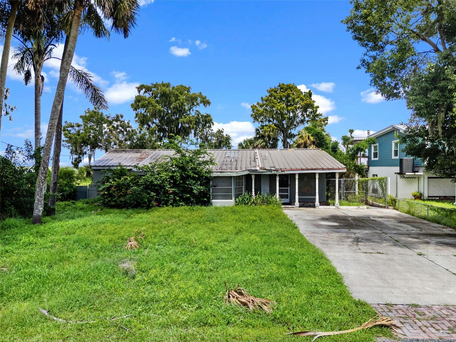 Here's your chance to secure a rare waterfront property with incredible potential in one of Oviedo's most scenic corridors. Located on Lake Jessup, 1754 Lake Street offers direct lake access, a sizable 2,500+ sq. ft. footprint, and sits on an oversized lot ideal for redevelopment or high-end renovation. The 3-bedroom, 2-bathroom home has sustained hurricane damage/flooding. With a private pool, space to rebuild a dock, and strong demand for waterfront living in the area, this property presents a compelling opportunity for the right buyer.
Situated just a 5-minute walk (0.2 miles) from Overlook Park, the location provides built-in lifestyle appeal, perfect for resale or rental positioning. Lakefront properties in this area rarely become available at this price point, especially with this kind of lot size and view potential.
Whether your strategy is fix-and-flip, long-term hold, or ground-up rebuild schedule a site visit today!