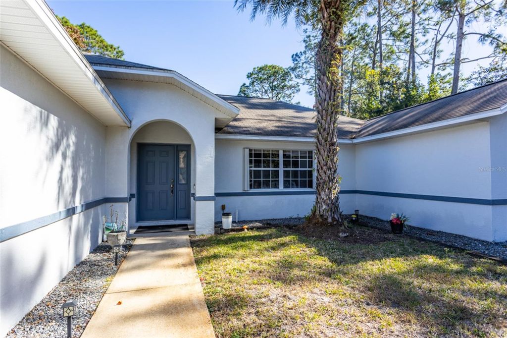 Photo of 86 Bren Mar Lane, Palm Coast, FL 32137 (MLS # FC314393)