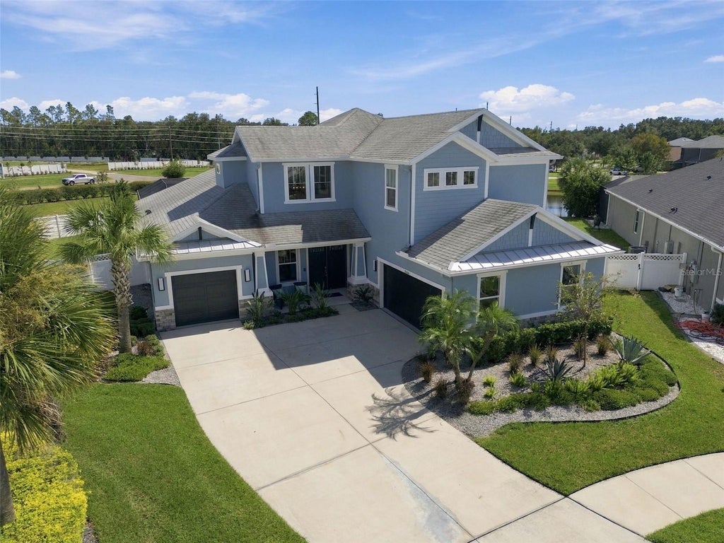 Photo of 7006 Talamore Drive, Wesley Chapel, FL 33545 (MLS # TB8558269)