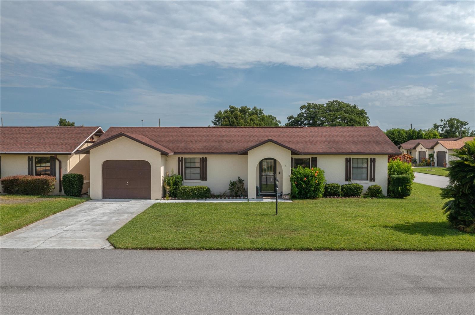READY TO MOVE IN THIS PARTIALLY FURNISHED NICE 2 BEDROOM 2 BATH HOME IN WONDERFUL GATED 55+COMMUNITY. SPLIT BEDROOM PLAN EACH WITH PRIVATE BATH. FULLY EQUIPPED KITCHEN AND LIVING ROOM DINING COMBINATION. STOVE, WASHER, DRYER, AND GARBAGE DISPOSAL. ALL APPLIANCES STAY.LAMINATE AND CERAMIC TILE FLOORING $75 MONTHLY HOA FEE INCLUDES LAWN MAINTENANCE, OUTSIDE WALL MAINTENANCE, GATE ENTRANCE, AND RECREATION BLDG. CLOSE TO SHOPPING, DOCTORS, CHURCHES. LOCATED NEAR HWY 27 AND I-4, ORLANDO-DISNEY AREA, AND ORLANDO/TAMPA AIRPORTS.