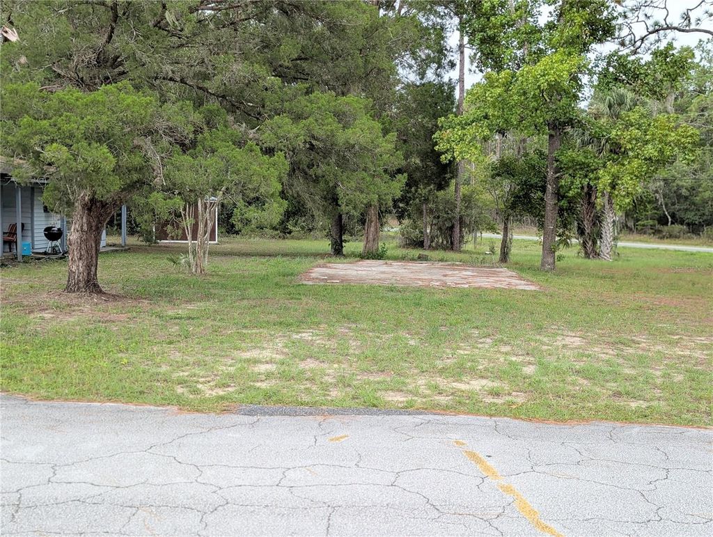 Photo of 4036 E Seminole Lane, Dunnellon, FL 34434 (MLS # OM707306)