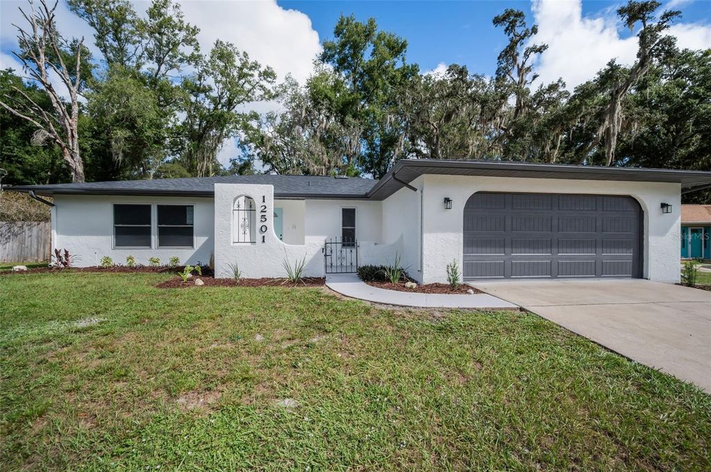 Photo of 12501 Shadow Ridge Boulevard, Hudson, FL 34669 (MLS # TB8434226)
