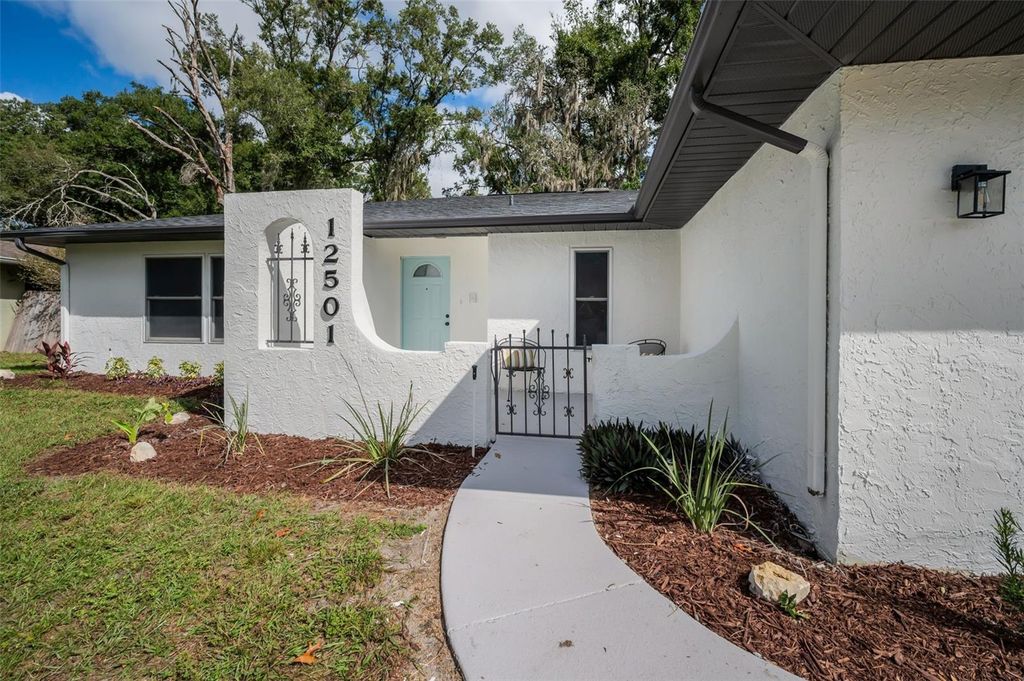 Photo of 12501 Shadow Ridge Boulevard, Hudson, FL 34669 (MLS # TB8434226)