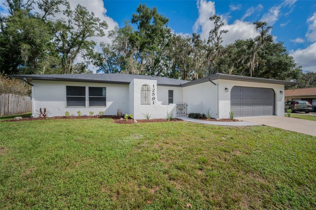Photo of 12501 Shadow Ridge Boulevard, Hudson, FL 34669 (MLS # TB8434226)