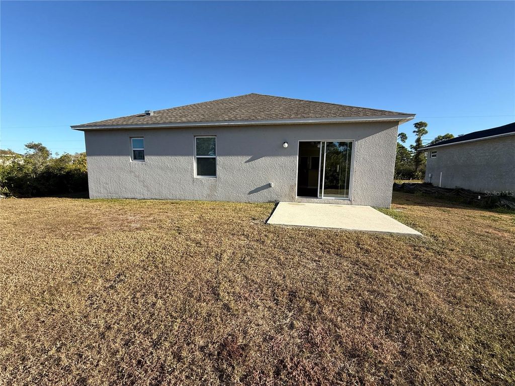 Photo of 14183 Salvatierra Lane, Port Charlotte, FL 33981 (MLS # O6368229)