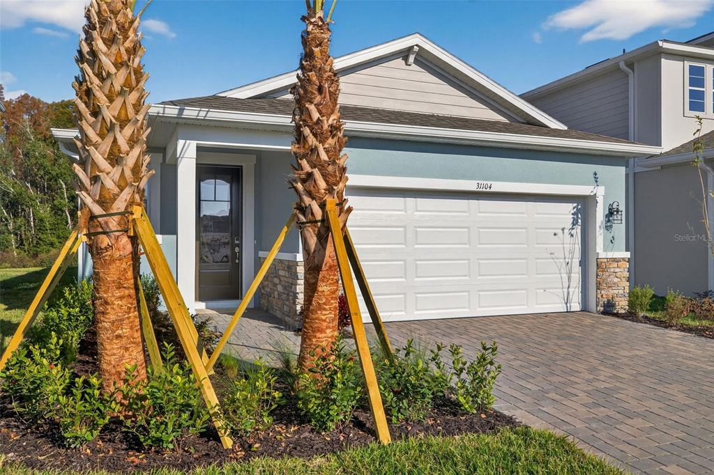 Photo of 31104 Pendleton Landing Circle, Wesley Chapel, FL 33545 (MLS # TB8414469)