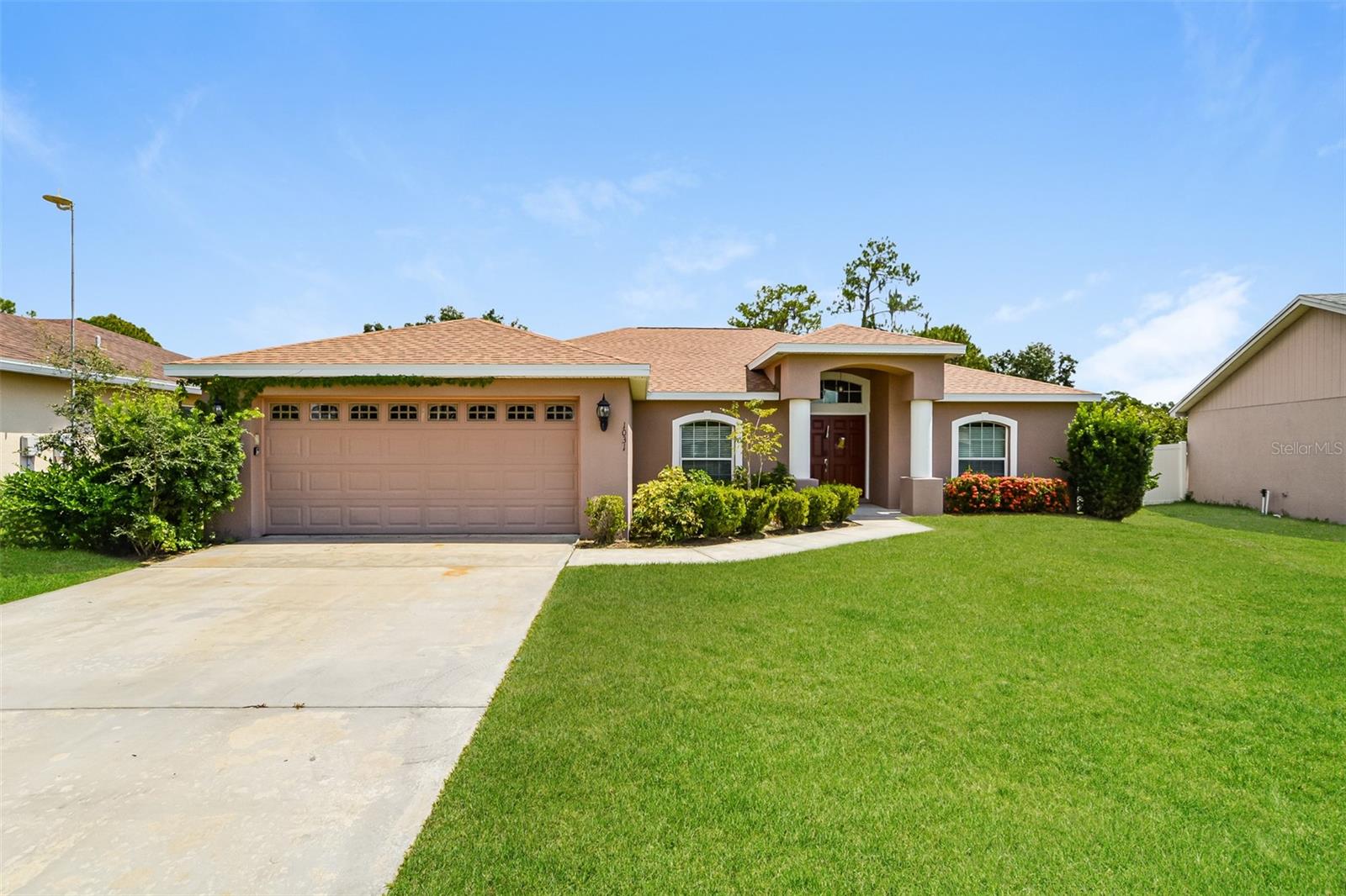 Charm and curb appeal abound for this Winter Haven home! Step inside into the inviting foyer and into the well-appointed living room, positioned at the center of the home. The kitchen boasts stainless steel appliances, hard surface countertops, and ample storage. This split, ranch-style floorplan offers the primary suite on one side of the home and two secondary bedrooms on the other along with a study, dining room, and laundry room. Enjoy your private, enclosed backyard all year long! Come and see for yourself the endless possibilities with this home!
