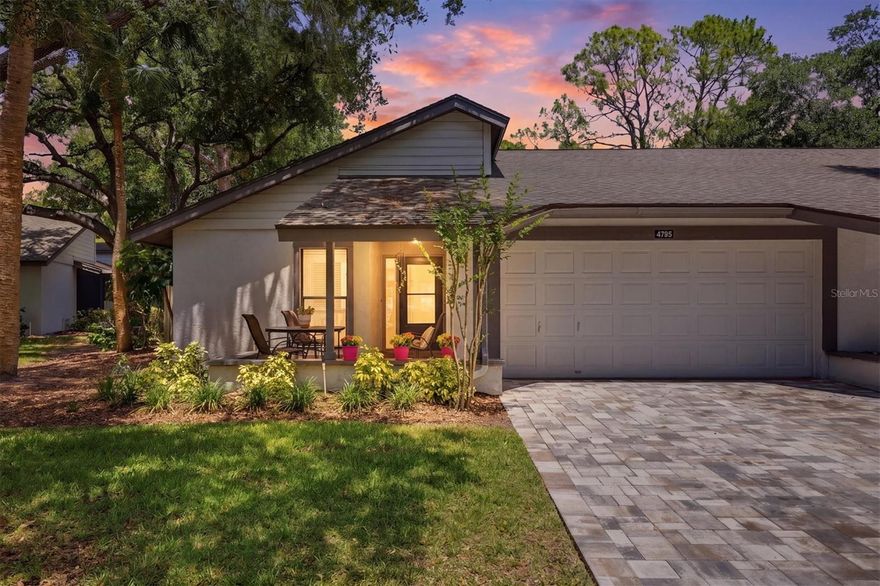 One or more photo(s) has been virtually staged. Just minutes from world-famous Siesta Key, this beautifully updated maintenance-free villa offers the perfect blend of comfort, convenience, and Florida lifestyle living. Nestled in a peaceful, tree-lined community with lush mature landscaping, you’ll enjoy being close to shopping, dining, entertainment, and everything you could want in Sarasota.

This spacious 2-bedroom, 2-bath residence is thoughtfully designed for both everyday living and entertaining. The bright and inviting enclosed lanai and additional living room provides flexible bonus space ideal for a home office, hobby room, formal dining area, or simply relaxing while taking in tranquil wooded views.

Inside, you’ll find numerous upgrades and features, including all new flooring, an updated kitchen and new appliances in 2024 enhanced with skylights for abundant natural light, updated bathrooms, and generous walk-in closets in both the primary and guest bedrooms. Major improvements include a new paver driveway and front walkway (2024), and a new roof (2021).

Additional highlights include an oversized laundry room complete with cabinetry, folding station, and utility sink, plus a 2-car attached garage.

Whether you’re seeking a year-round residence or seasonal retreat, this charming villa offers low-maintenance living in an exceptional location. This fantastic community is not an age restricted community, is pet friendly and offers tennis, pickleball, heated pool and clubhouse. Schedule your private showing today and discover why this delightful community is such a wonderful place to call home. Located NOT in a flood zone and NO CDD fees.