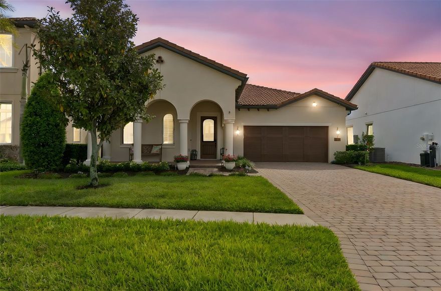 Discover refined elegance and resort-inspired living in this exquisite Toll Brothers residence, nestled within the prestigious guard-gated enclave of Royal Cypress Preserve. Perfectly positioned just moments from Walt Disney World® and Orlando’s premier shopping, dining, and entertainment, this exceptional single-story home offers an unparalleled blend of sophistication, comfort, and convenience.
From the moment you enter, you are greeted by soaring 12-foot ceilings, rich wood-look porcelain tile flooring, bespoke lighting, and classic plantation shutters—each detail thoughtfully curated to create a timeless and inviting ambiance. The open-concept design flows effortlessly, ideal for both everyday living and elegant entertaining.
At the heart of the home, the gourmet chef’s kitchen is a true showpiece, featuring an expansive granite island, premium stainless-steel appliances, under-cabinet lighting, and finely crafted upgraded cabinetry—designed to inspire culinary creativity and effortless gatherings.
The spacious great room transitions seamlessly to an exceptional outdoor retreat. The screened lanai is a private sanctuary, complete with a custom summer kitchen, sleek granite countertops, Artisan grill, and beverage refrigerator—perfect for al fresco dining and entertaining, all enhanced by the rare privacy of no rear neighbors.
The luxurious primary suite offers a serene escape, boasting dual walk-in closets and a spa-inspired bath with double vanities and an oversized walk-in shower. Two additional en-suite bedrooms provide refined comfort and privacy for family and guests alike.
As a resident of Royal Cypress Preserve, enjoy exclusive access to world-class amenities including a private lakefront clubhouse, resort-style swimming pool, state-of-the-art fitness center, dog park, and a private boat ramp to South Lake—offering a lifestyle of leisure and distinction.
Zoned for top-rated schools and ideally located near Orlando’s most sought-after attractions, this remarkable home embodies the perfect harmony of luxury, privacy, and elevated living.