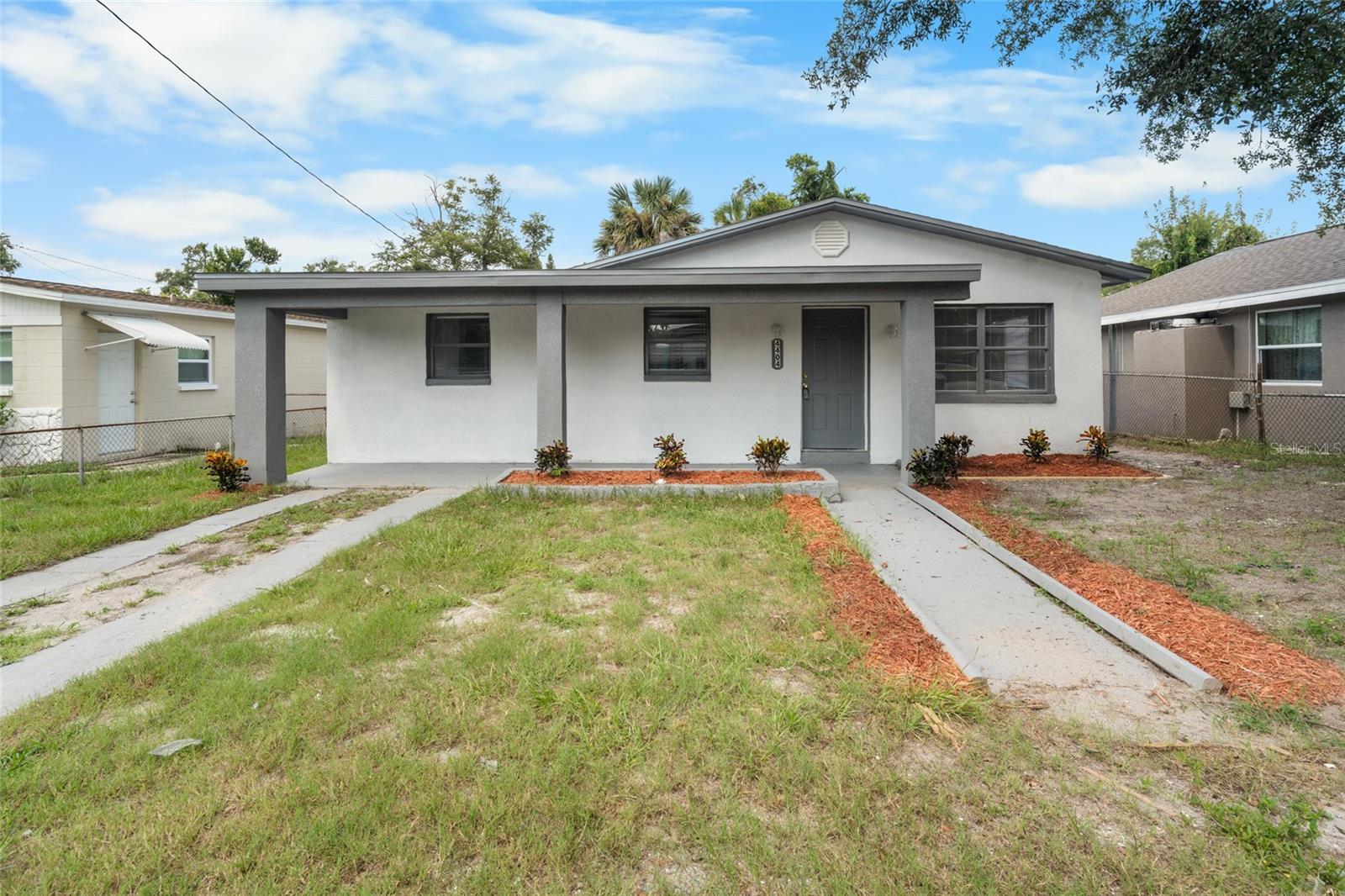 One or more photo(s) has been virtually staged. 4404 N Troy Street has been thoughtfully updated and is ready for its next chapter. With four bedrooms, two bathrooms, and a generous yard, this home offers space to grow in a location that makes life in Tampa easy and connected.
Inside, the layout is open and inviting. The living and dining areas flow naturally into the updated kitchen, where you’ll find new appliances, clean finishes, and plenty of counter space. It’s designed for both everyday meals and gatherings, keeping everything within reach. Large windows bring in natural light, making each room feel bright and comfortable.
The four bedrooms give you options. Use them all for sleeping spaces, or reimagine one as an office, guest room, or playroom. Both bathrooms have been refreshed with simple, modern details that feel current without being overdone.
Outside, the covered front entry gives the home a welcoming presence, and the oversized backyard offers a rare chance to create the outdoor setup you’ve always wanted. There’s space for entertaining, gardening, or adding features over time.
The location adds another layer of appeal. Just minutes from Downtown Tampa, Ybor City, and major highways, you’ll have an easy drive to work, the airport, and some of the best beaches in Florida. Restaurants, shopping centers, schools, and parks are all close by, while attractions like Busch Gardens and ZooTampa are perfect for weekend outings.
4404 N Troy Street isn’t just renovated—it’s practical, well-placed, and ready for someone to make it home.