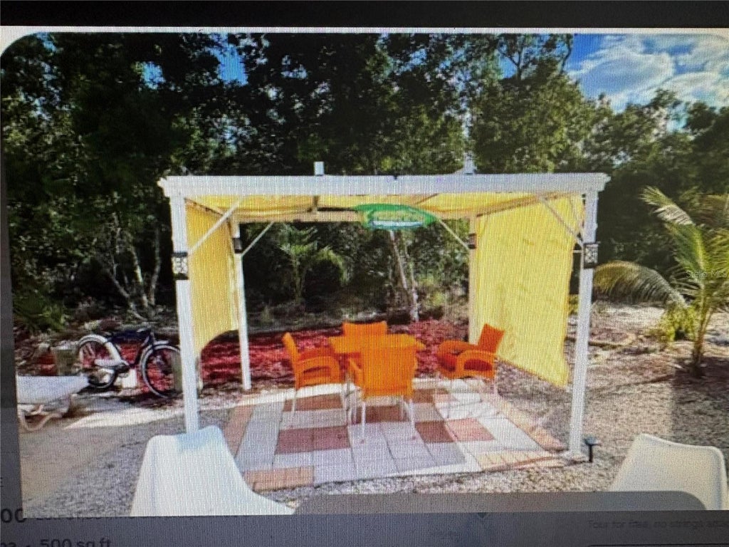 Photo of 32 Grassy Lake Circle, Lake Placid, FL 33852 (MLS # O6446048)