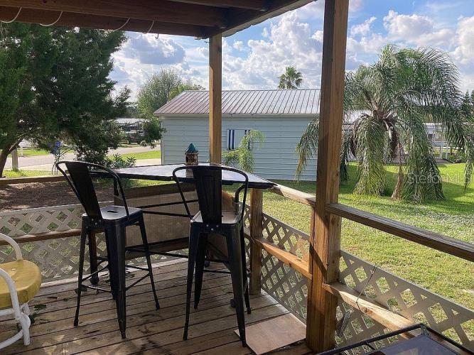 Photo of 32 Grassy Lake Circle, Lake Placid, FL 33852 (MLS # O6446048)