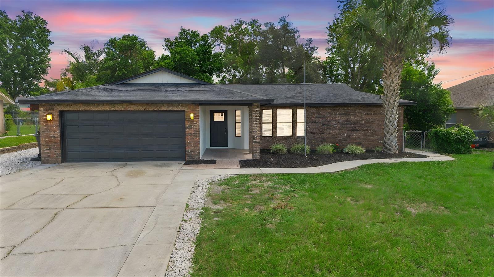 Step into comfort and style with this beautifully renovated 3-bedroom, 2-bath home, tucked away in a quiet, well-established neighborhood with no HOA restrictions. Every inch of this home has been thoughtfully updated—from the flooring to the fixtures—making it truly move-in ready. Enjoy the peace of mind that comes with a brand-new roof, plus the convenience of being just minutes from I-4, offering easy access to Orlando, Daytona Beach, and all that Central Florida has to offer. The interior boasts a fresh, modern layout with spacious bedrooms, two full bathrooms, and a kitchen designed for both everyday living and entertaining. Outside, the recently cleared backyard provides a blank canvas for your outdoor dreams—whether it's a garden, patio, or play space.