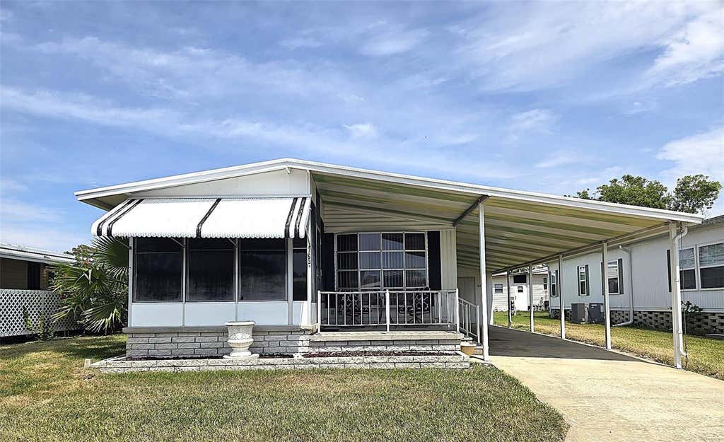 Photo of 39820 Us Highway 19 N #153, Tarpon Springs, FL 34689 (MLS # TB8500592)