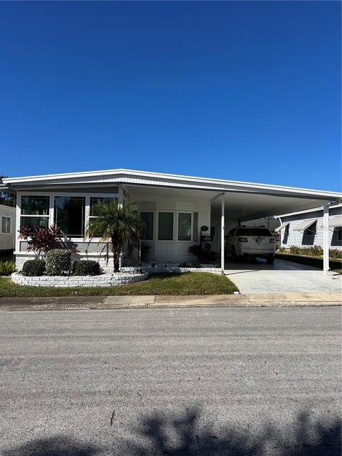 Photo of 20 Mountain Laurel Drive, Palm Harbor, FL 34684 (MLS # TB8559423)