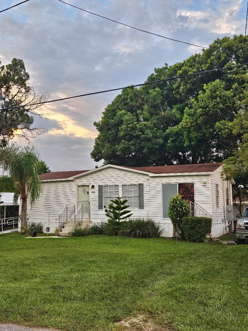 Ready to move-in. 3/2 Manufactured home in a great location. Close to shopping and all major highways. The property includes a storage shed that is 12x10 and a Carport. The home is handicapped accessible. The lot size is 79 x 100. Master bath has his and hers sinks, with a stand up shower. The A/C unit is 2 years old and the roof is 3 years old. The water heater is less than a year old. No Homeowners Association!