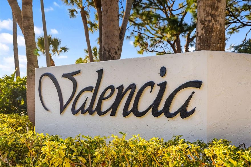 Dream without compromise. Live moments away from world-renowned IMG Academy, where champions train, and enjoy the privileges of golf without the dues of membership—just pay as you play. Savor resort-style living in Valencia II, featuring three community pools, beautifully maintained grounds, and an unmatched location close to everything coastal Florida offers.

Step inside and experience peace of mind and elegant living: a 20-foot hurricane-rated glass wall, installed November 2025, brings the outdoors in—framing sweeping views while designed to withstand even the strongest storm. This residence is not in a flood zone, allowing you to relax and enjoy nature’s show from the safety of your home.

The newly updated kitchen features a modern backsplash, sleek grey cabinetry, and newer stainless steel appliances. Both bathrooms have been stylishly renovated. Luxury vinyl plank flooring flows through the home, complemented by fresh interior paint that gives a move-in ready feel. Covered parking is just outside your door for convenience.

HOA includes water, trash, and more, helping simplify your monthly living. Love the beach? It’s just down the road. Prefer the arts? You’re minutes from the Manatee Players, Bradenton theatres, Sarasota Symphony, and cultural venues. Whether dining waterfront, golfing for the afternoon, or attending a performance, it’s all so easily accessible.

For flexibility and investment potential, you may lease the property up to twice per year with no waiting period before renting.

Where you live is as important as what you live in… here, both are exceptional.