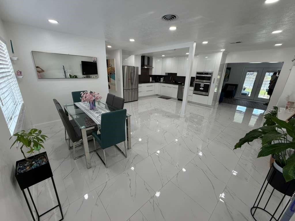 Photo of 13216 Forest Hills Drive, Tampa, FL 33612 (MLS # TB8488611)