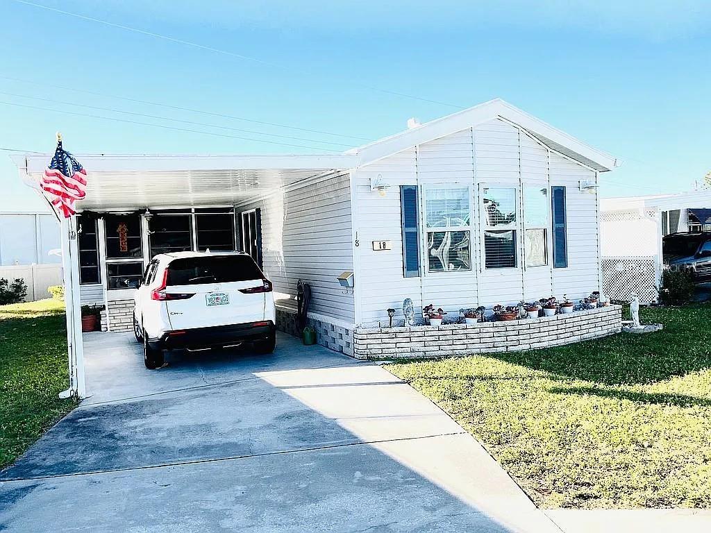 Welcome to Brook to Bay, a 55+ cooperative just minutes to Manasota Key Beach. This spacious double wide manufactured home has two bedrooms, two full bathrooms and a large bright and airy Florida room. Open concept living room, kitchen and dining area. The kitchen offers ample cabinetry, and stainless steel appliances including a built in dishwasher and microwave. The mud room features full size laundry, cabinetry and storage shelves. New roof in 2023. The carport provides covered parking and there is additional driveway parking for 1 car. Attached shed / tool room. Patio with a new Sunsetter awning. Some of the amenities include a heated pool, a fishing pier, a small boat dock, clubhouse, and shuffleboard courts. Low HOA fee of $158 per month. All this, plus Intracoastal access for small boats / kayaks / SUPS via Forked Creek! This move in ready home is being sold turnkey. Come join this vibrant community!