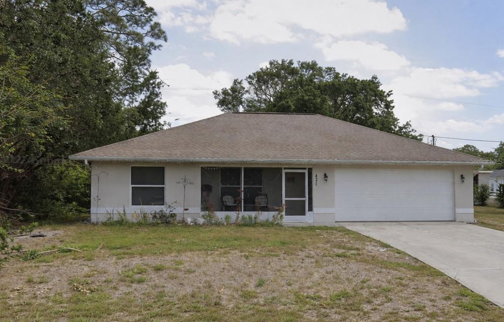 Photo of 821 Red Bay Street, Port Charlotte, FL 33948 (MLS # OM717952)
