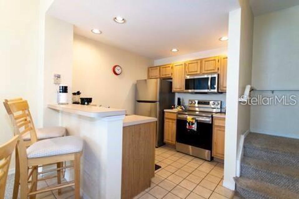 Photo of 4011 Venetian Bay Drive #106, Kissimmee, FL 34741 (MLS # O6393079)