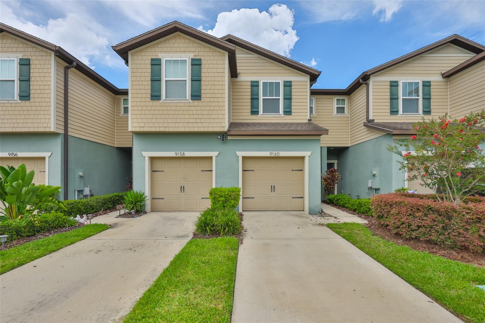 ATTENTION RENTERS! This upgraded townhome features stainless steel appliances and granite countertops throughout, blending style with comfort. Park in your private driveway or garage, then step directly into the kitchen for easy access. The bright and inviting living room is filled with natural light from large sliding glass doors, offering peaceful pond views that can also be enjoyed from the master bedroom. Magnolia Park boasts fantastic amenities, including three swimming pools, a splash pad, multiple playgrounds, a basketball court, and miles of scenic walking trails. Perfectly located near everything the Tampa Bay area has to offer, this home combines convenience, beauty, and community in one. Tenant will pay $125.00 tenant processing fee at move in along with and rent and deposit(s). A non-refundable pet fee will be due at move in as well, if applicable.