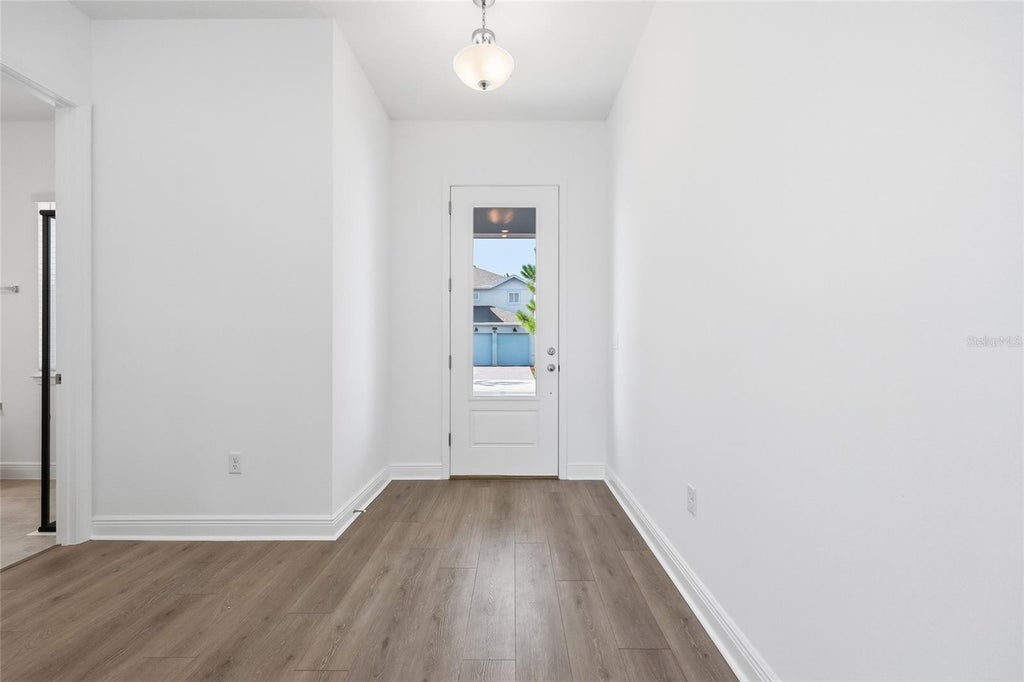 Photo of 10085 Ballast Drive, Orlando, FL 32827 (MLS # S5155037)
