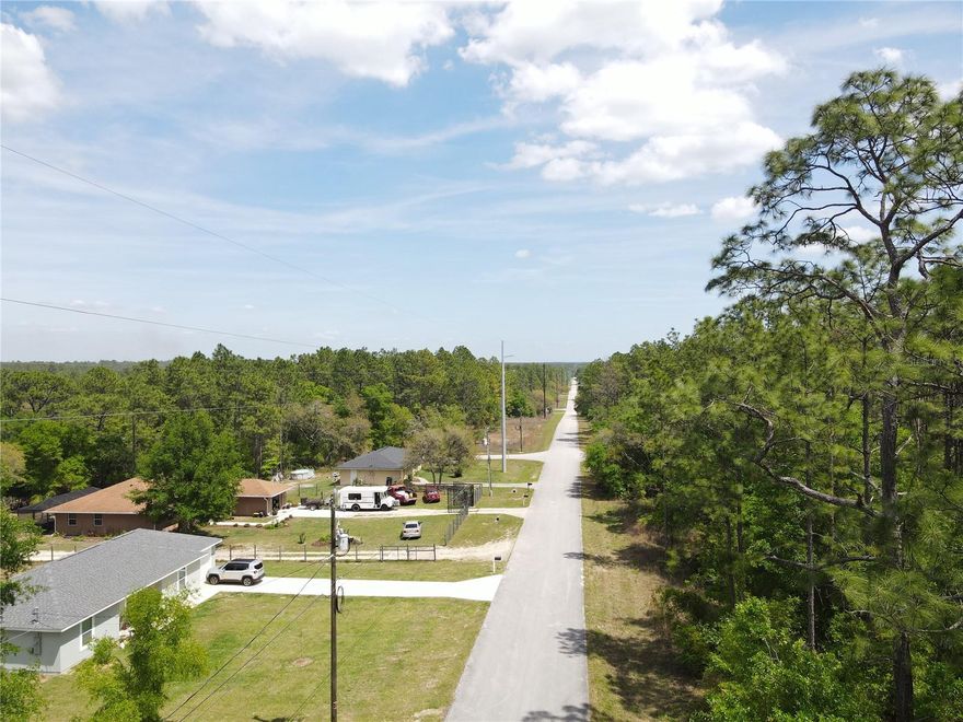 Double lot for sale, just under 2 acres zoned R1 in Rainbow Acres, buildable high and dry with a great view, on a paved road near Rainbow Springs and Dunnellon. Great opportunity to get into a developing area at the right price.