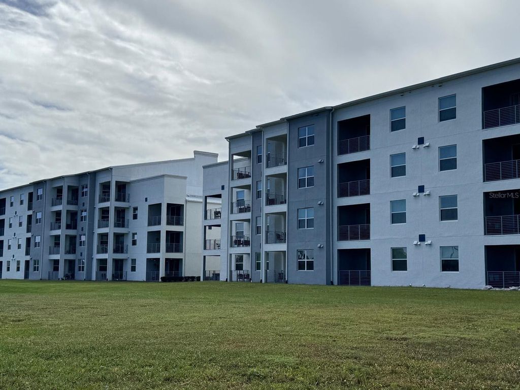 Photo of 3111 Paradox Circle #201, Kissimmee, FL 34746 (MLS # O6388962)