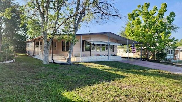 IF YOU ARE SEEKING COMFORT, SECURITY, & PEACE OF MIND- LOOK NO FURTHER!! Located in the desirable High Point 55+ community, this remodeled 2 bed/ 2 bath home is TRUELY STORM-READY WITH IT'S OWN PRIVATE 8 PERSON STORM SHELTER! Recent upgrades include a NEW ROOF (2022), HVAC system (2024), DOUBLE-PANE HURRICANE IMPACT WINDOWS, HURRICANE SHUTTERS, NEW LVP FLOORING & CARPET THROUGHOUT. The interior & exterior have recently been PROFESSIONALLY PAINTED and are finished with gutters & downspouts. Enjoy multiple outdoor living spaces, including a FLORIDA ROOM with AC, LARGE PORCH with NEW SCREENS, A SEPARATE OPEN/COVERED PORCH, AND WORKSHOP with washer & dryer. Outside, the property is equipped with an irrigation system, in-ground pest control system, & 8 PERSON STORM SHELTER- a rare and valuable addition! Enjoy all the amenities High Point has to offer with a LOW HOA OF ONLY $44 A MONTH! THIS IS FLORIDA LIVING WITH PEACE OF MIND!