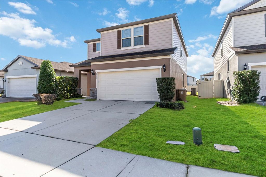 Photo of 3566 Southern Cross Loop, Kissimmee, FL 34744 (MLS # O6368866)