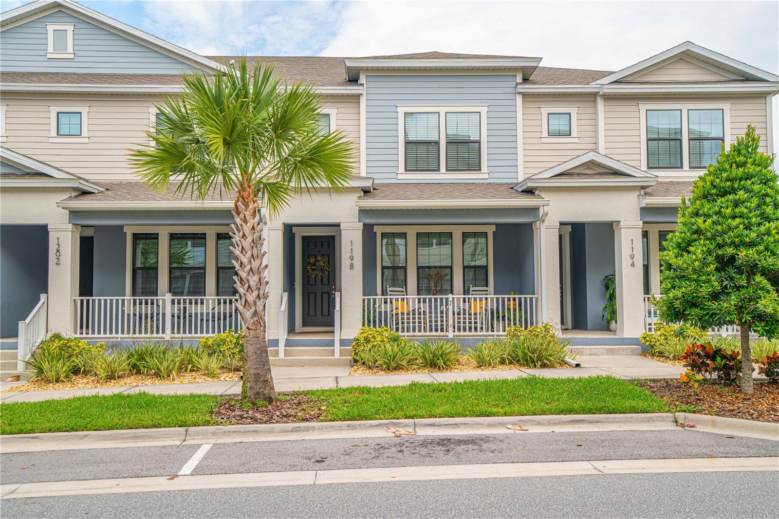 Welcome to this fantastic newer construction townhome in the heart of Winter Springs, built in 2023 and located on a premium lot. This beautifully maintained 3-bedroom, 2.5-bathroom home offers a spacious and functional layout with a loft, a two-car garage, and tasteful upgrades throughout. Step inside to an open-concept floorplan where the living, dining, and kitchen areas flow seamlessly — perfect for entertaining or everyday living. The kitchen features quartz countertops, stainless steel appliances, an oversized island, and a generous walk-in pantry. Durable wood-look tile extends throughout the main floor, adding a sleek, modern touch, and a convenient half bath is located downstairs for guests. Upstairs, a flexible loft space can serve as a home office, play area, or entertainment zone, depending on your needs. The primary suite includes a beautifully upgraded custom walk-in closet and a spacious en suite bathroom. Two additional bedrooms, a full bathroom, and a laundry room complete the upper level — with ceiling fans and walk-in closets in every bedroom. Additional upgrades include designer light fixtures, premium ceiling fans, and epoxy flooring with ceiling-mounted storage racks in the garage. This home also includes a premium builder design package for an elevated aesthetic. Best of all, you’re just a short walk to Winter Springs Town Center, where you'll find Publix, Starbucks, Foxtail Coffee, Tijuana Flats, Huey Magoo’s, and more than 30 restaurants, shops, and offices. Enjoy Florida living with the community pool just across the street, and take advantage of the convenient proximity to 417 for easy access to work or play. This move-in ready townhome blends comfort, style, and location — don’t miss your chance to call it home!
