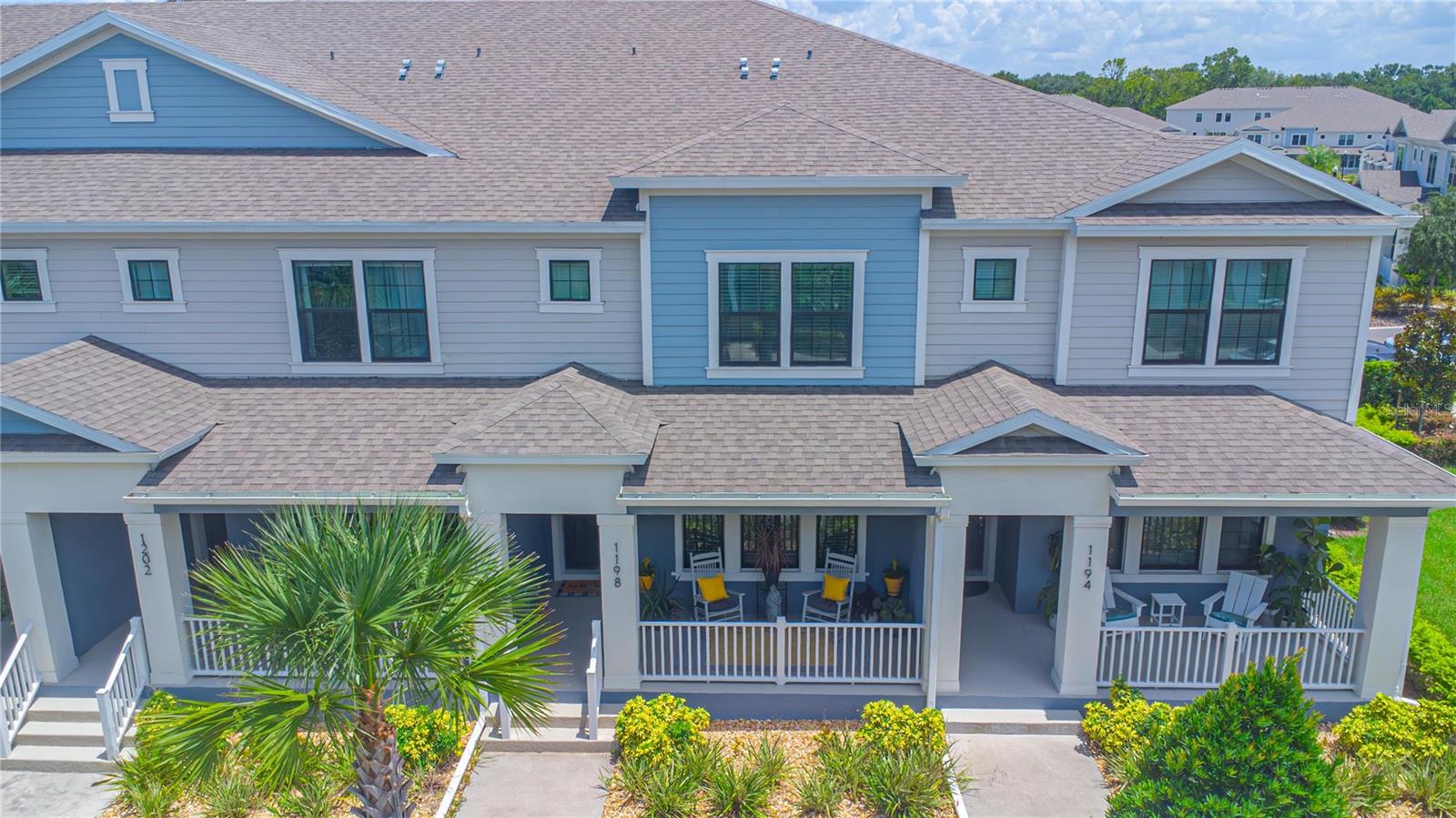 Welcome to this fantastic newer construction townhome in the heart of Winter Springs, built in 2023 and located on a premium lot. This beautifully maintained 3-bedroom, 2.5-bathroom home offers a spacious and functional layout with a loft, a two-car garage, and tasteful upgrades throughout. Step inside to an open-concept floorplan where the living, dining, and kitchen areas flow seamlessly — perfect for entertaining or everyday living. The kitchen features quartz countertops, stainless steel appliances, an oversized island, and a generous walk-in pantry. Durable wood-look tile extends throughout the main floor, adding a sleek, modern touch, and a convenient half bath is located downstairs for guests. Upstairs, a flexible loft space can serve as a home office, play area, or entertainment zone, depending on your needs. The primary suite includes a beautifully upgraded custom walk-in closet and a spacious en suite bathroom. Two additional bedrooms, a full bathroom, and a laundry room complete the upper level — with ceiling fans and walk-in closets in every bedroom. Additional upgrades include designer light fixtures, premium ceiling fans, and epoxy flooring with ceiling-mounted storage racks in the garage. This home also includes a premium builder design package for an elevated aesthetic. Best of all, you’re just a short walk to Winter Springs Town Center, where you'll find Publix, Starbucks, Foxtail Coffee, Tijuana Flats, Huey Magoo’s, and more than 30 restaurants, shops, and offices. Enjoy Florida living with the community pool just across the street, and take advantage of the convenient proximity to 417 for easy access to work or play. This move-in ready townhome blends comfort, style, and location — don’t miss your chance to call it home!