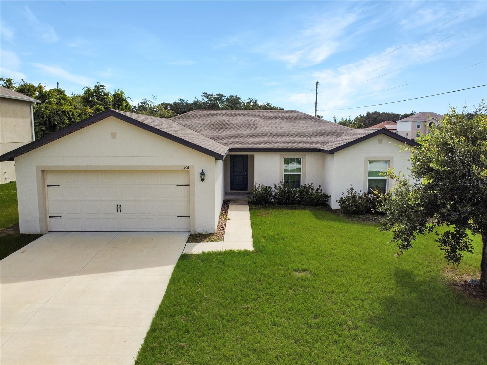 Available for Immediate Move-In!
Welcome to this beautifully maintained, nearly new home located in the heart of Poinciana. Situated on a desirable corner lot, this spacious residence features the sought-after Bimini floor plan, designed with an open-concept layout that’s perfect for both everyday living and entertaining.
The gourmet kitchen is a true centerpiece, featuring granite countertops, a large kitchen island, 36” upper wood cabinets with crown molding. Adjacent to the kitchen is a dedicated dining and living area, offering seamless flow and ample natural light.
Enjoy the comfort of a generously sized primary suite, complete with a spacious walk-in closet. Additional highlights include a separate laundry room, a two-car garage, and plenty of storage throughout.
As part of the Poinciana community, residents have access to a wide range of amenities, including parks filled with activities, sports courts, multiple playgrounds, conservation areas, and nearby amusement parks—perfect for families or anyone seeking an active lifestyle.
Don’t miss the opportunity to make this move-in-ready home your next retreat!