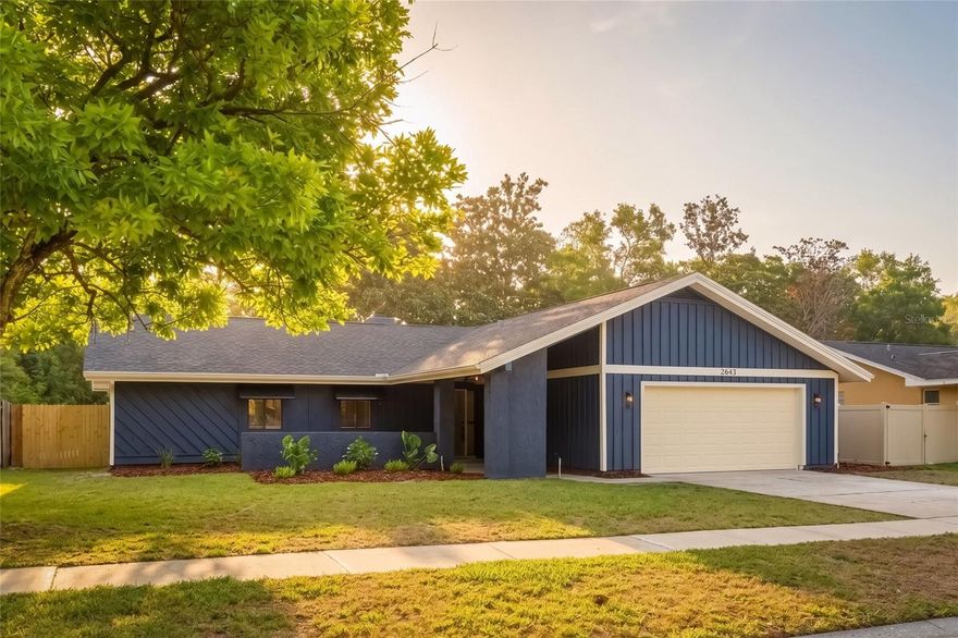 Discover this beautifully renovated 3-bedroom, 2-bath pool-home SANCTUARY overlooking a serene pond, where indoor comfort meets breathtaking outdoor living. Perfectly positioned for tranquil water views and exceptional privacy, this home embodies true Florida charm. Its standout feature is the expansive, light-filled Florida room—designed for year-round enjoyment with panoramic views of the sparkling pool and peaceful pond, making it the ideal setting for morning coffee, evening unwinding, or effortless entertaining. Inside, the open-concept layout flows seamlessly, featuring a spacious living area with abundant natural light, a cozy wood-burning fireplace, and a stunning kitchen with luxurious quartz countertops, designer backsplash, modern cabinetry, premium stainless-steel appliances, and a breakfast bar perfect for casual dining. The primary suite offers a relaxing retreat with generous space, a large walk-in shower, and beautiful views of the pool and pond, while two additional bedrooms and a fully renovated bath with dual sinks provide flexibility for guests, family, or a home office. Step outside to your private backyard oasis, where the pool area invites you to relax, entertain, and soak in the tranquil waterfront backdrop. With its expansive Florida room, crystal blue pool, bright open living spaces, versatile bedrooms, and peaceful setting-High and dry with no flood insurance required, this exceptional property also offers convenient access to the world-famous beaches, minutes from the Countryside Mall, top-rated golf courses, and the pristine sands of Honeymoon Island. Just a short drive to Safety Harbor, Dunedin, Tampa, and St. Petersburg. Convenient access to shopping, dining, and major roadways—this home delivers the ultimate Florida lifestyle. Don’t miss the chance to own this slice of paradise where every day feels like a getaway.