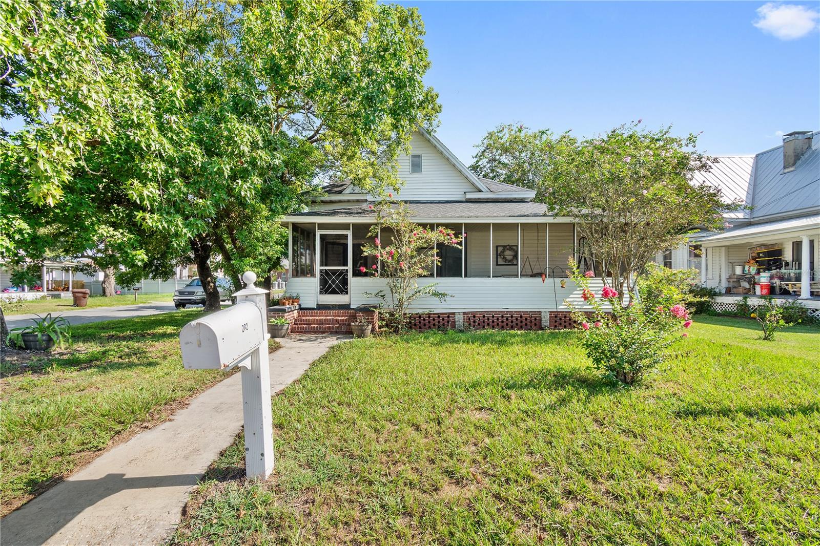 Welcome to your dream home in charming Mulberry, Florida! This cozy and inviting 3-bedroom, 2-bath gem is perfect for families seeking comfort, character, and a peaceful neighborhood vibe. Step inside through the adorable front porch and be greeted by a beautiful craftsman-style archway in the entryway, setting the tone for the home's unique charm. The living and dining rooms feature custom molding that adds warmth and personality, making everyday moments feel special. The spacious kitchen is perfect for home-cooked meals, and the generously sized bedrooms provide a peaceful retreat for every member of the family. Conveniently located near schools, parks, and local shopping, this lovingly maintained home is ready to welcome you-don't miss your chance to make it yours!