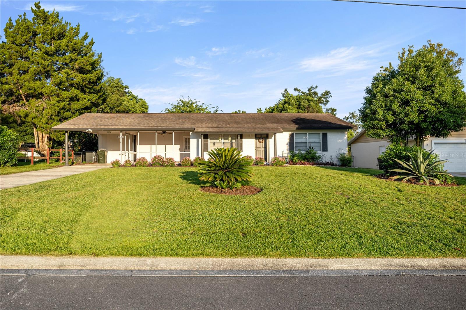Welcome to this beautifully updated and charming 2-bed, 2-bath home nestled in one of Ocala’s most desirable NE neighborhoods. This home is move-in ready and packed with updates that blend comfort, style, and functionality. Step into a stunning renovated kitchen featuring brand-new granite countertops, a modern tile backsplash, new appliances, and sleek laminate flooring that flows seamlessly into the dining area. Both bathrooms have been completely remodeled, showcasing granite countertops atop new vanities, with elegant marble tile shower walls, and new tile flooring. The living room is spacious and tiled, while the bedrooms boast plush brand-new carpet for added comfort. The front yard is beautifully landscaped, with a welcoming front porch that could easily be screened in or with a little imagination converted into a third bedroom with the right permitting. You can enjoy outdoor living on the covered back porch ideal for relaxing evenings or weekend BBQs. Additional features include: One-car carport, built-in shed for storage, and two small storage sheds. This home offers both charm and convenience, ideal for a first-time buyer, downsizer, or savvy investor. Don’t miss this opportunity to own a stylishly updated home in the heart of Ocala close to schools, shopping, parks, and medical centers!