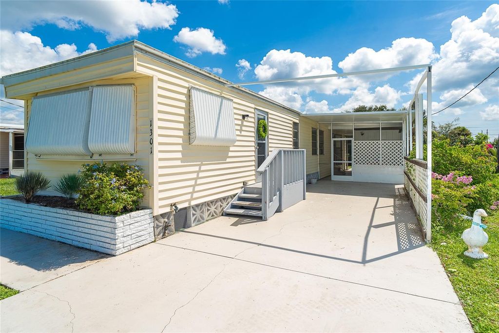 Photo of 1301 Kingfisher Drive, Englewood, FL 34224 (MLS # D6143603)
