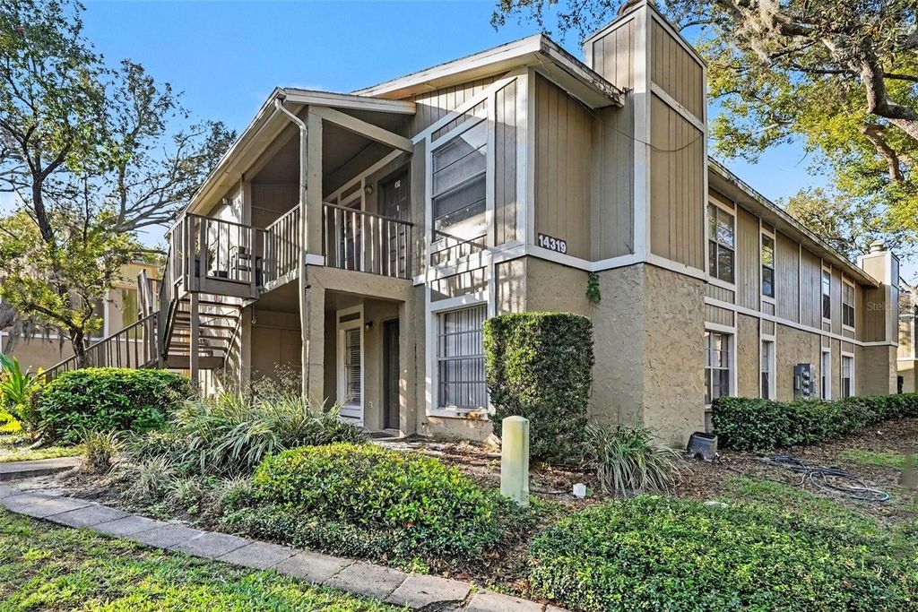 Photo of 14319 Hanging Moss Circle #101, Tampa, FL 33613 (MLS # TB8485608)