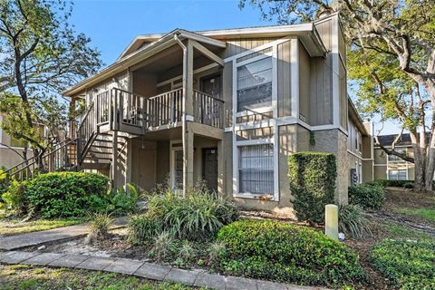 Photo of 14319 Hanging Moss Circle #101, Tampa, FL 33613 (MLS # TB8485608)