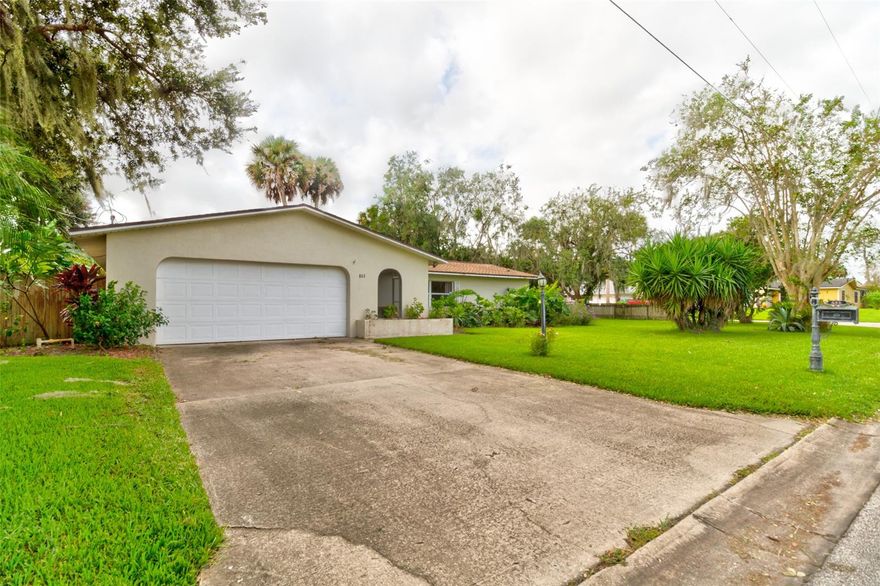 Well maintained three bedroom two bath home on a beautifully landscaped large corner lot. Enjoy a variety of outdoor screened sitting areas in both the front and back of the home. Split bedroom floor plan with a formal living room, as well as a family room/TV room off the guest rooms with the kitchen situated between. Sandwedge Drive is located in Indian River Plantation, no HOA, but quiet neighborhood close to the NSB municipal golf course, just a few minutes to downtown Canal St, shopping, and the beach. ;Water: City