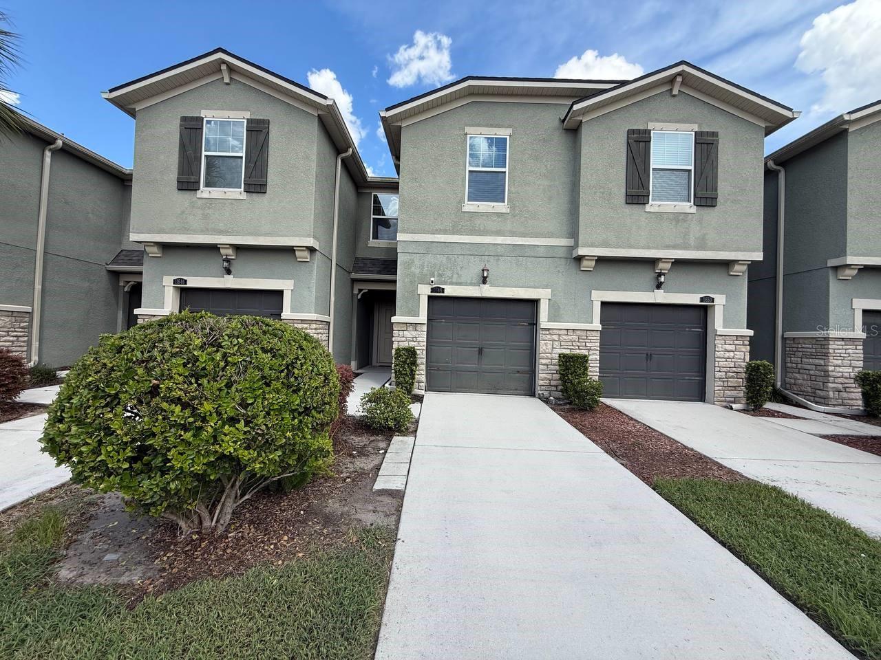 Experience contemporary living at its finest in this exquisite Riverview townhome, where spaciousness, style, and convenience combine to provide you with the ideal living space. As you step inside, you'll immediately notice the open kitchen and living room area, creating an inviting and expansive atmosphere that's perfect for gatherings and everyday life. A half bathroom downstairs adds to the convenience of your daily routines. The large kitchen island is perfect for a breakfast bar, offering the ideal setting for casual meals, entertaining, or simply enjoying your morning coffee. Step outside to your own private oasis a screened-in patio with no rear neighbors. This tranquil space is perfect for outdoor relaxation, dining, and enjoying the Florida weather in privacy. Upstairs, discover a well-thought-out split floorplan that offers privacy and space for everyone. A large loft provides additional versatile living space that can be transformed to suit your unique needs. The primary bathroom boasts a double vanity and a larger walk-in shower, adding a touch of luxury to your daily routines. The convenience of a washer and dryer ensures that laundry day is a breeze. Updated appliances throughout the townhome enhance both style and functionality, catering to your modern lifestyle. Enjoy the seamless flow and easy maintenance of ceramic tile throughout the first floor, while carpeted bedrooms provide a cozy and comfortable retreat. This Riverview townhome's central location offers easy access to local amenities, dining, entertainment, and everything you need for a vibrant lifestyle. Pets are welcome at the owner's discretion - 2 pets, 100lb max. In addition to the advertised base rent, all residents are enrolled in the Resident Benefits Package (RBP) for $50.00/month which includes HVAC air filter delivery, credit building to help boost your credit score with timely rent payments, utility concierge service making utility connection a breeze during your move-in, and much more! More details upon application. Occupied/Available 11/07/25.